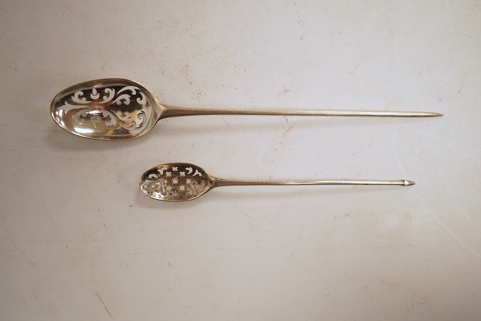 Two 18th century silver mote spoons, the largest with makers marl ?L below a crown, 13.1cm.